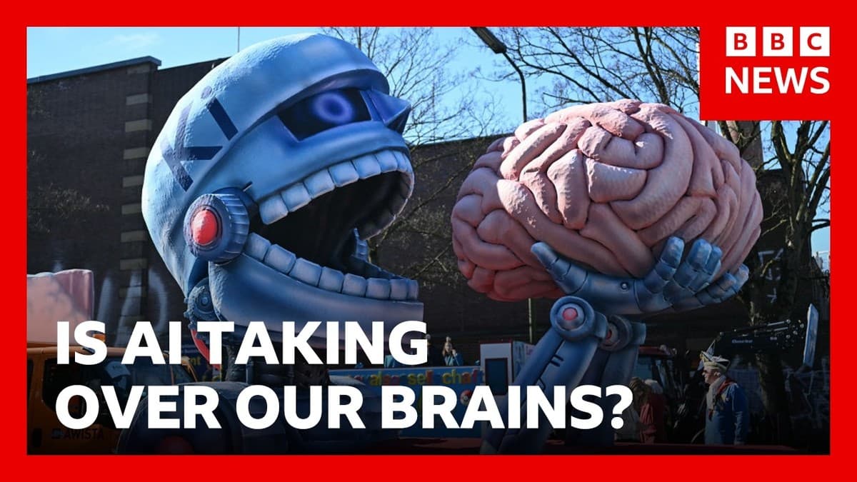 Carnival float showing a robot figure holding a giant human brain up to its open mouth, beside a BBC News caption asking whether AI is taking over our brains.